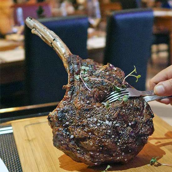 Tomahawk Steak Black Angus rib eye on the bone cha