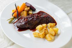 Dive into Scrumptious House Specialties in Coral B